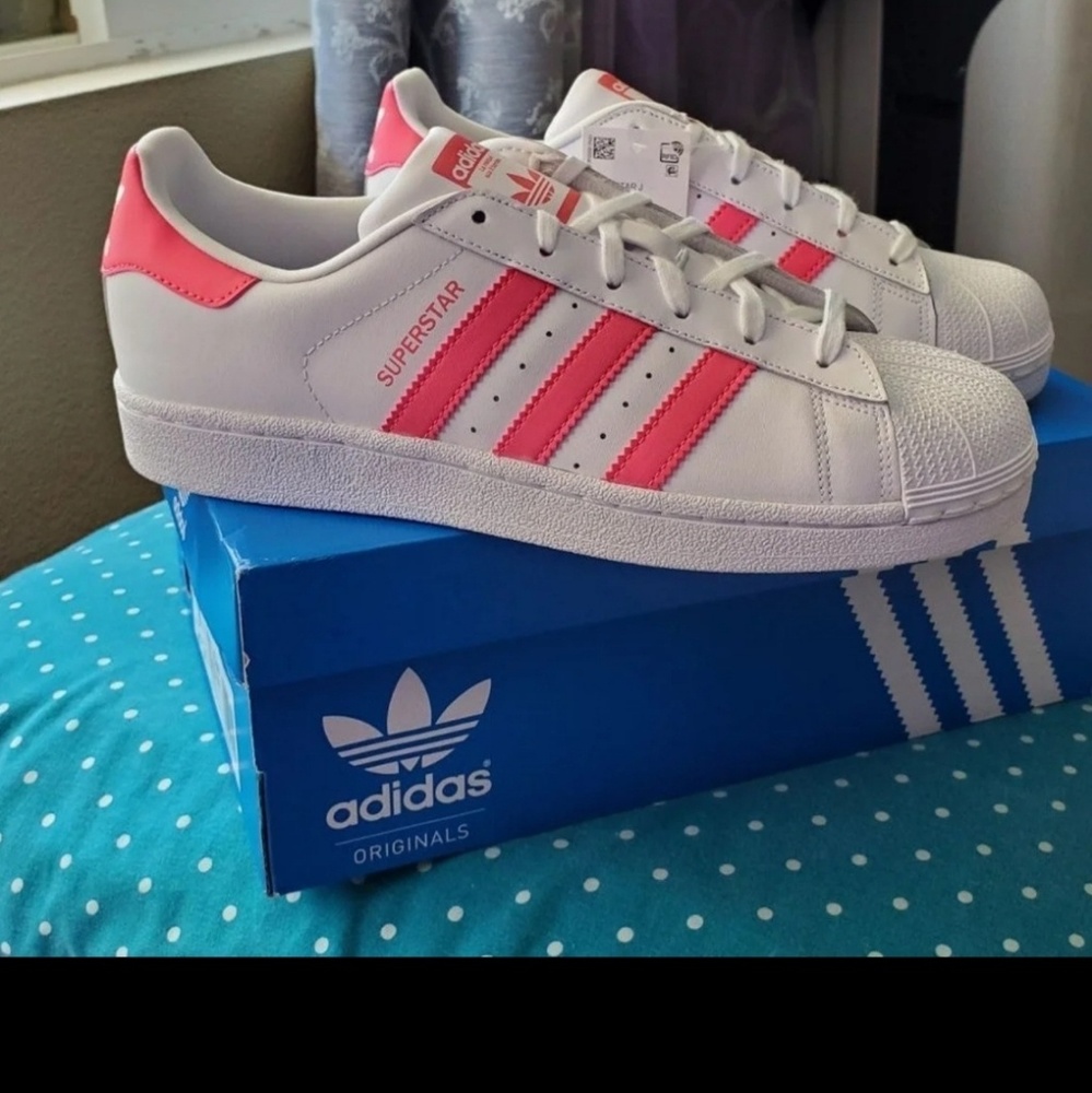 Adidas Shell toe sneakers.